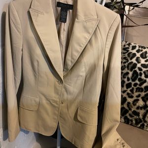 The limited stretch to button blazer, size 2